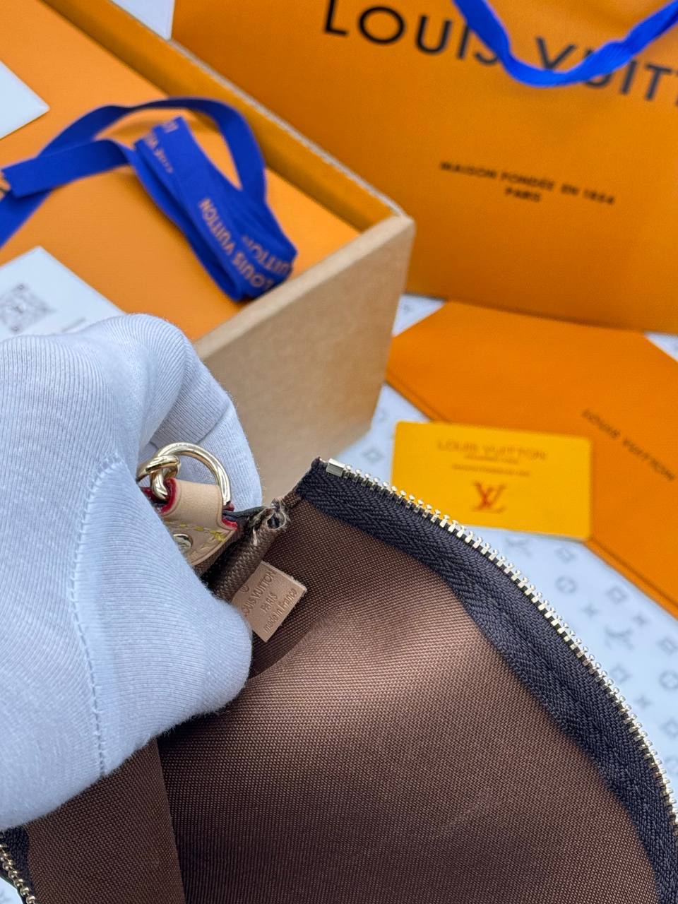 Клатч Louis Vuitton 10