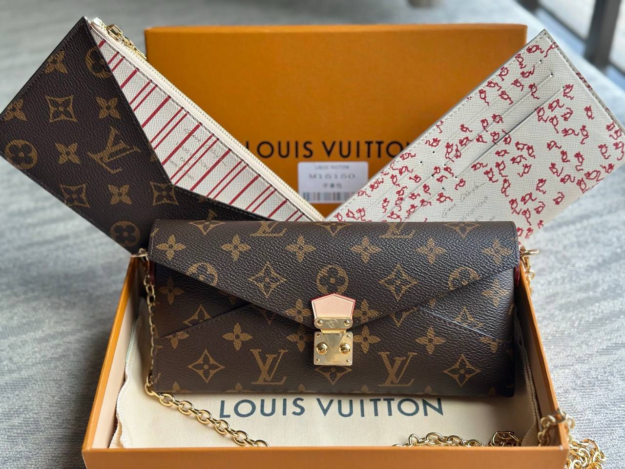 Клатч Louis Vuitton 2