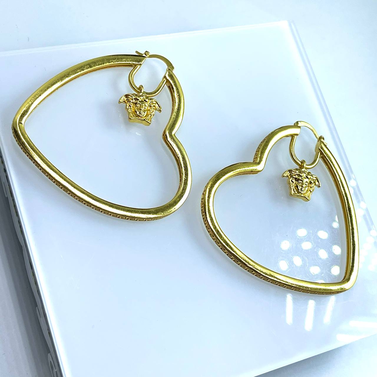 Серьги Versace